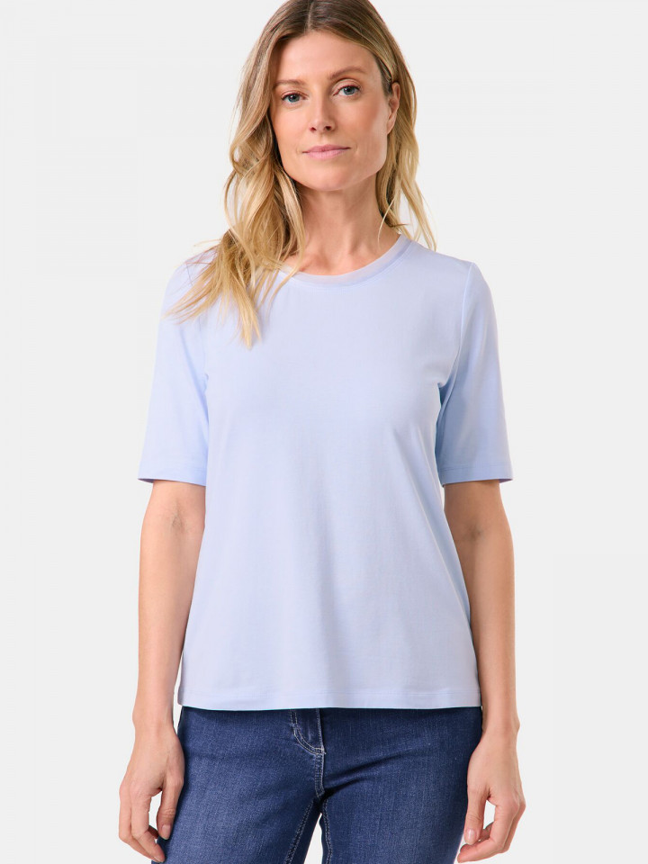 Topp med satinkant ljusblå från Gerry...