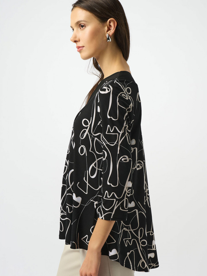 Trikåtopp svart med illustration från...