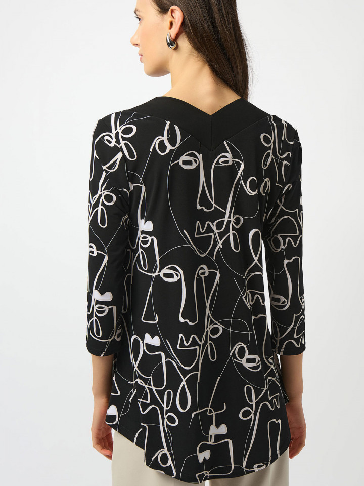 Trikåtopp svart med illustration från...