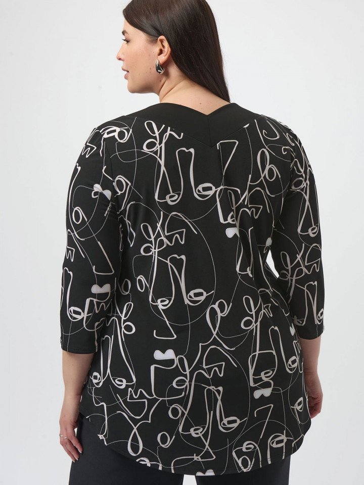 Trikåtopp svart med illustration från...