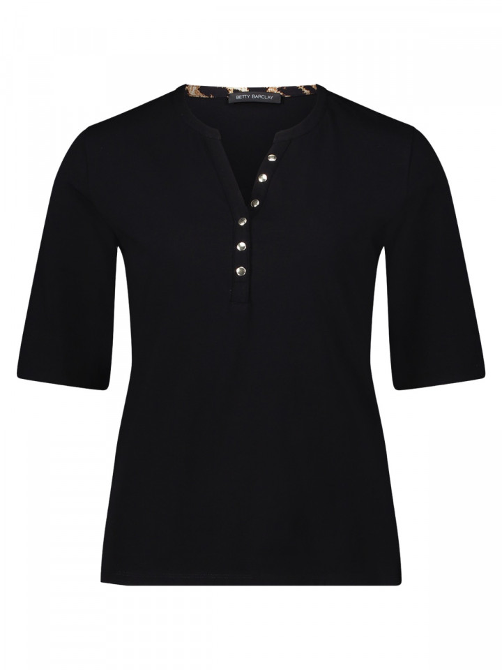 Trikåtopp svart nitar och leo från...