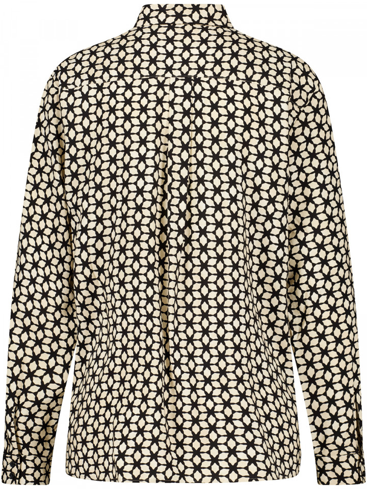 Viskosblus beige grafiskt mönster...