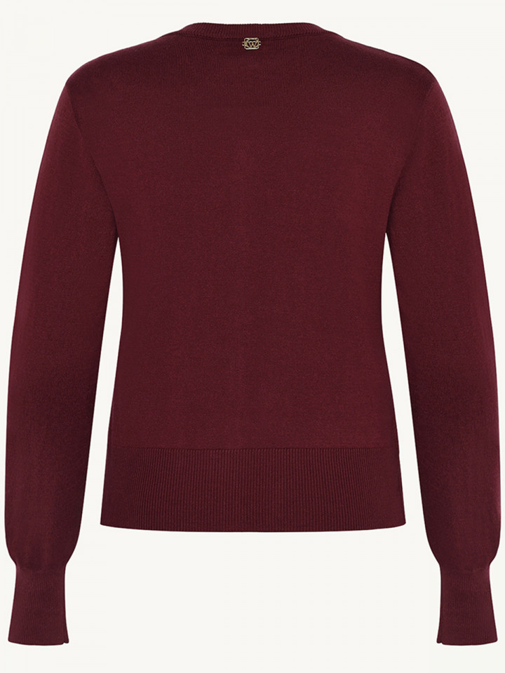 Finstickad kofta med pärlknappar...