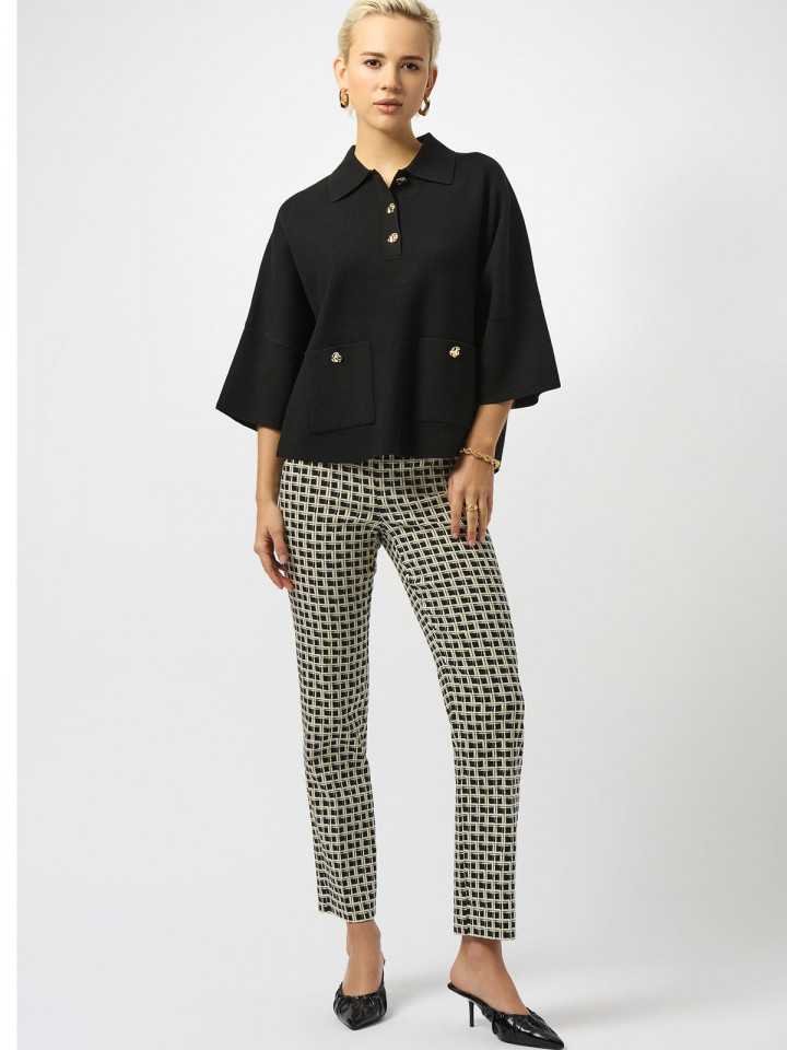 Finstickad tröja svart med guldknapp...