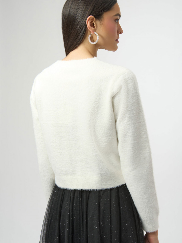 Borstad kofta med strassrosett...