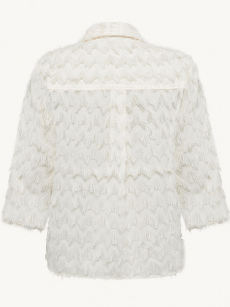 Blus fransar cremevit från Claire