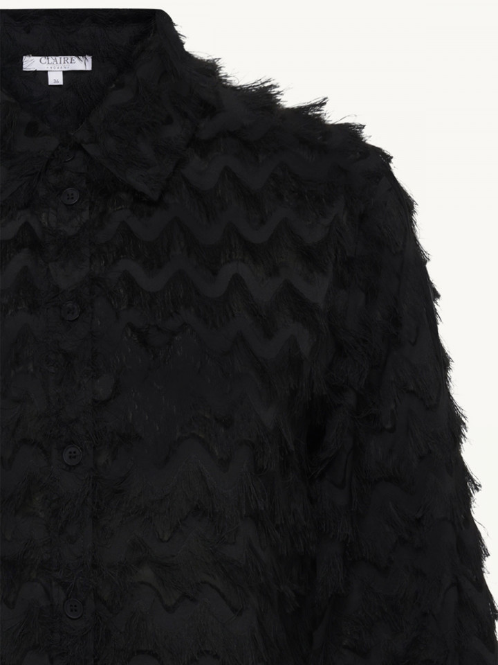 Blus fransar svart från Claire