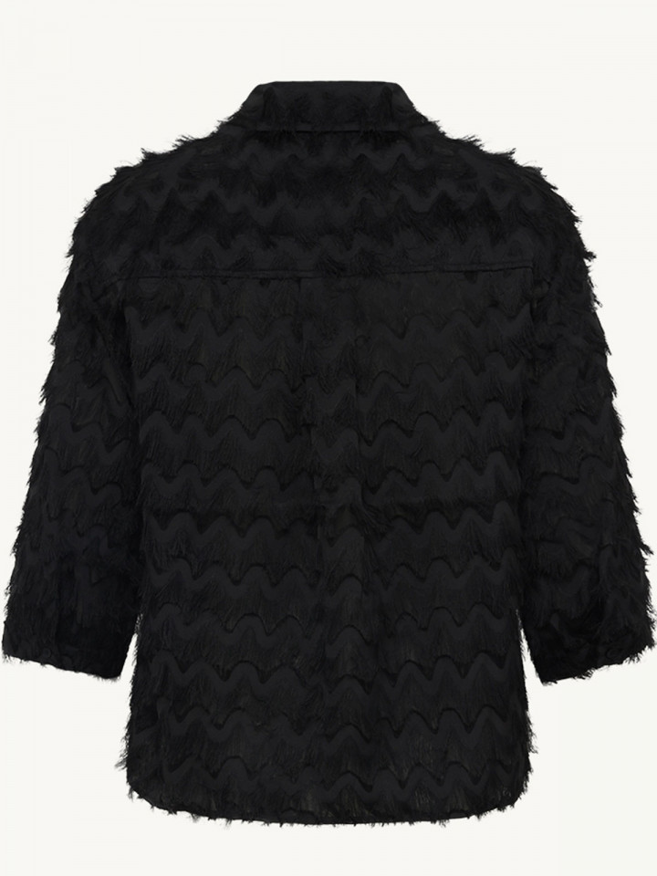 Blus fransar svart från Claire