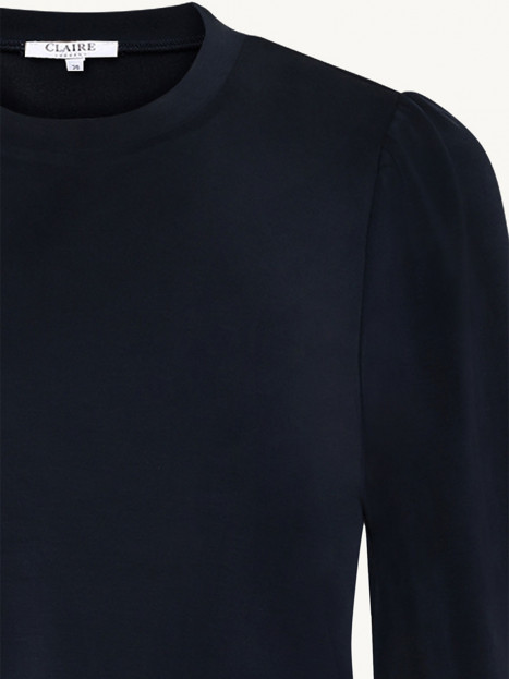 Trikåklänning marin puffärm från Claire