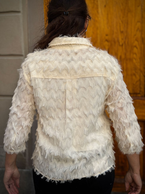 Blus fransar cremevit från Claire