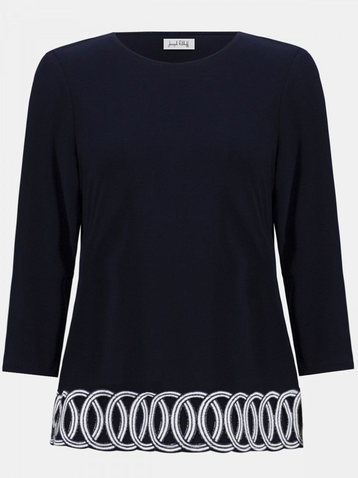 Trikåtopp med dekorativ kant marin...