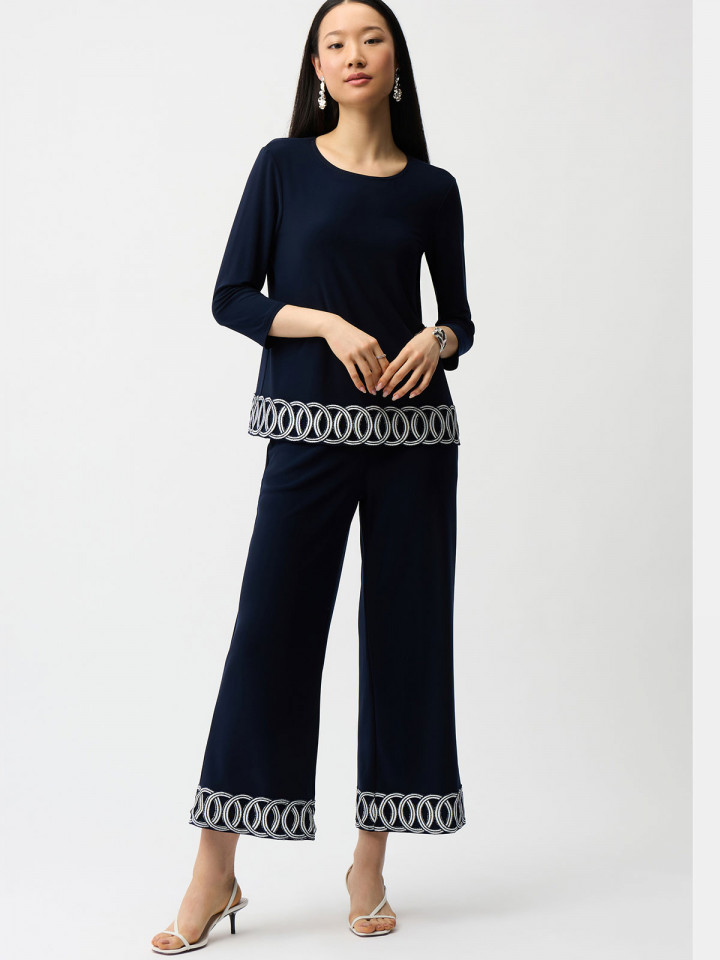 Trikåbyxa marin vita cirklar från...