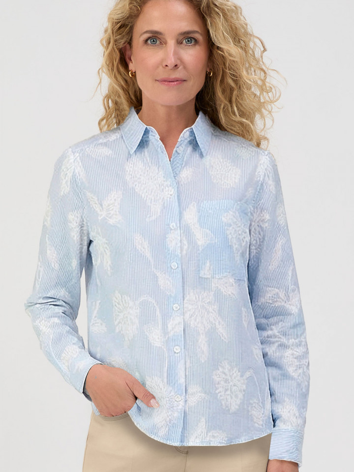 Blus ljusblå rand med applikationer från Bianca