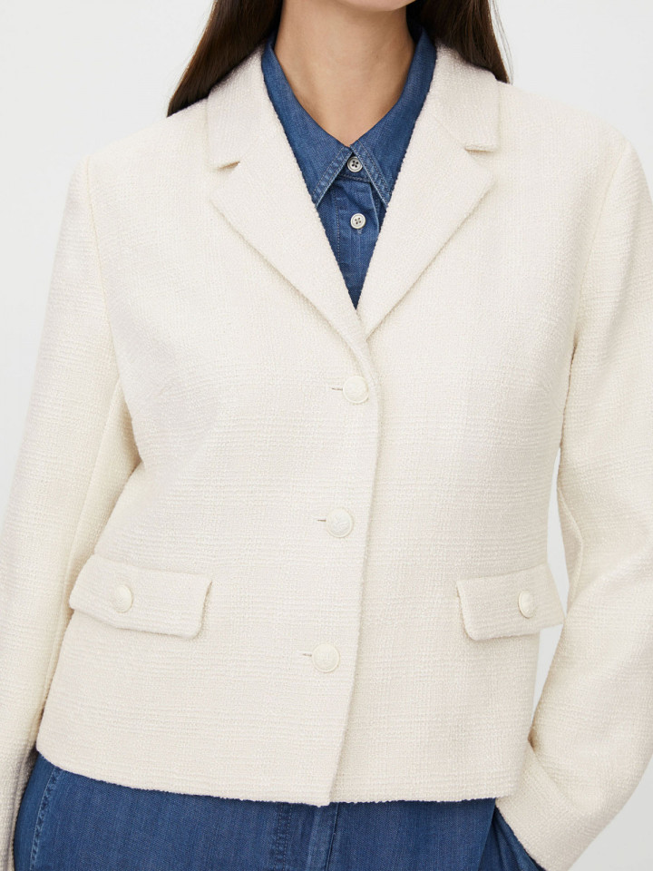 Boucléjacka Jaxanja cremevit från Masai