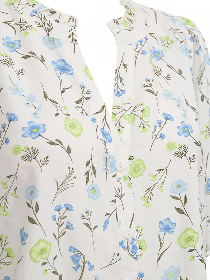 Blus Molli cremevit blom från FreeQuent