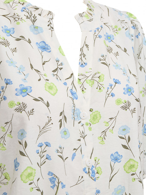 Blus Molli cremevit blom från FreeQuent