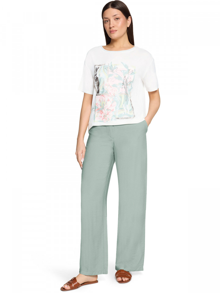 Topp creme med silverdekor från Betty...