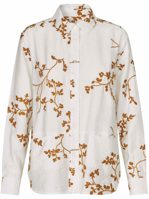 Blus Inanne creme med bronsfärgad brodyr från Masai